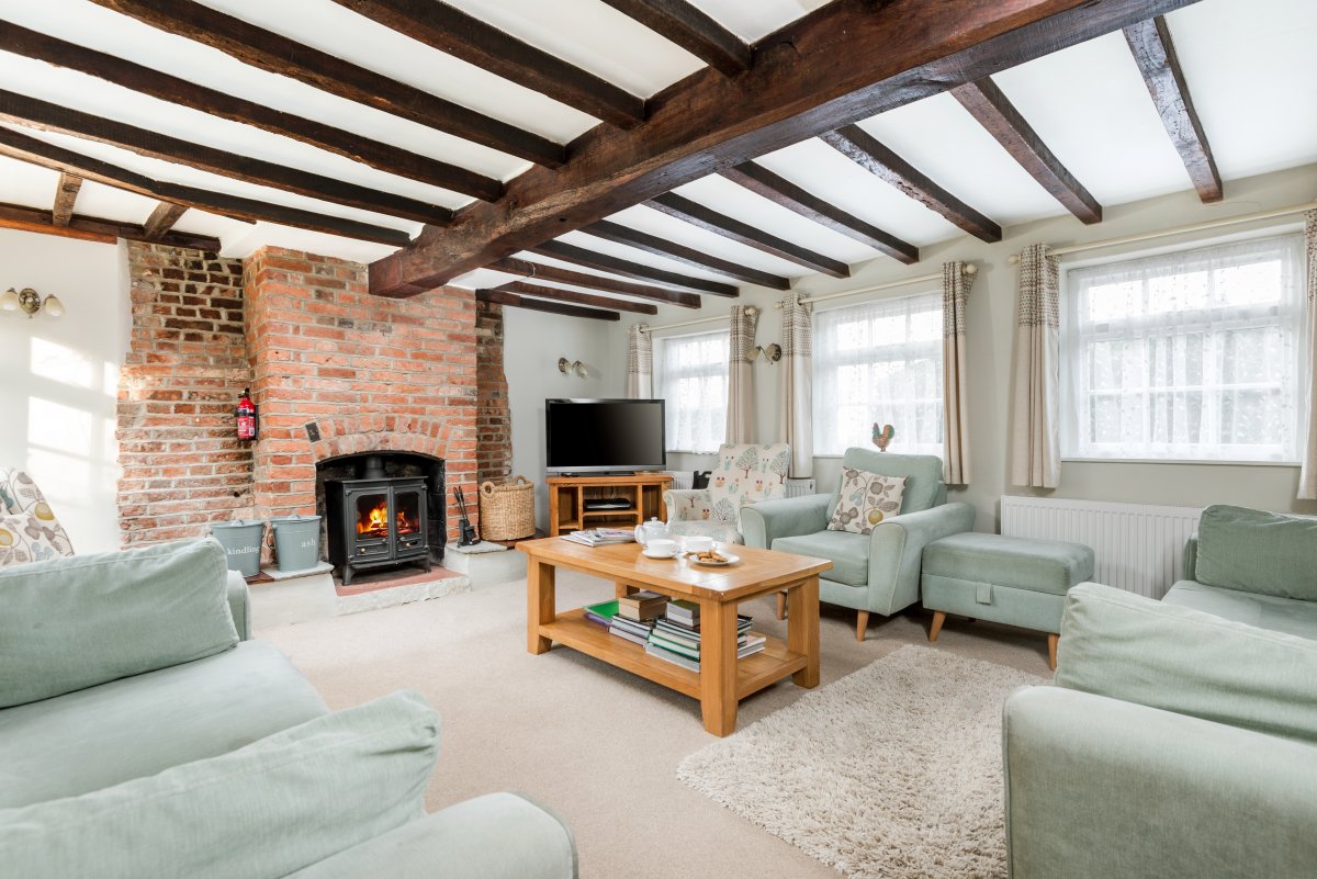 Beck Cottage - lovely light and spacious lounge with cosy wood stove